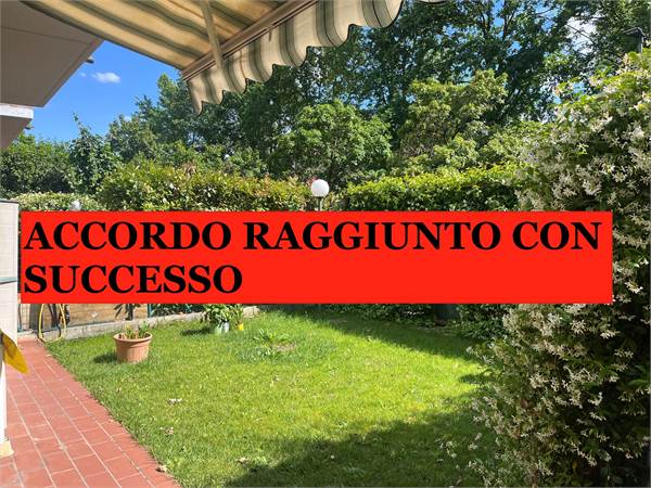 Appartamento con giardino e tre camere da letto